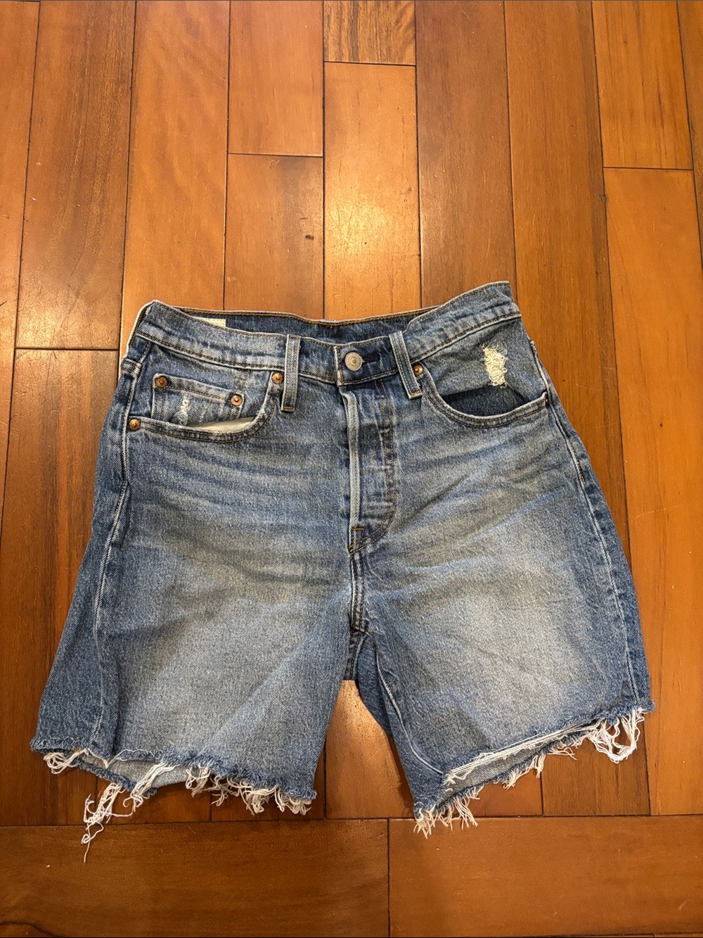 LeviWomen's Distressed Denim Shorts - Light Blue